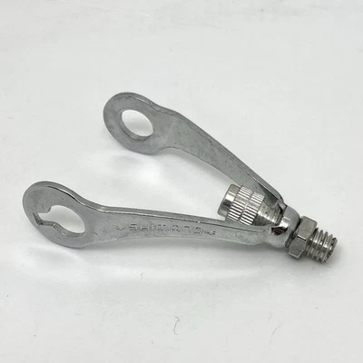 NOS VINTAGE SHIMANO BICYCLE CABLE HANGER REAR BRAKE GUIDE SEATPOST CLAMP - Image 1 of 2