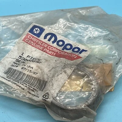 Junta de brida de escape OEM NOS Mopar 53000692 para Jeep Cherokee 1984-1986 Foto 1 de 2