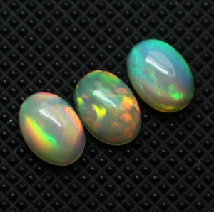 Opal Cabochon Gemstone Natural Ethiopian Opal Oval Cabochon Set Loose Opal 7X5MM - Picture 1 of 5