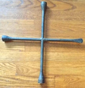 Four Way Tire Iron - lug nut wrench - its about 16 & 1/2 inches across - Picture 1 of 1