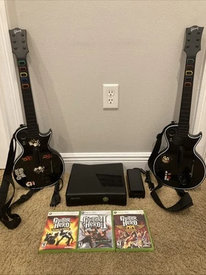 Consola Xbox 360 S 4GB + Paquete Guitar Hero + Guitarras + Juegos. ¡Probado!! Foto 1 de 4