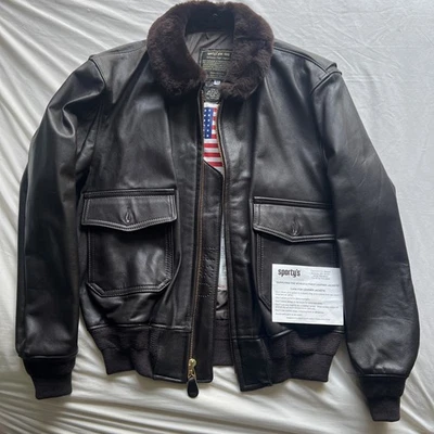 Chaqueta de vuelo bombardero de cuero marrón Sporty’s Pilot Shop azul marino G-1 para hombre nueva Foto 1 de 4