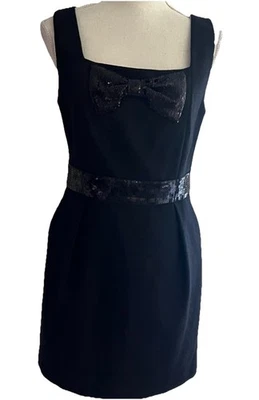 Vestido de fiesta Forever 21 Little negro mediano mezcla de lana lentejuelas lazo y banda Foto 1 de 4
