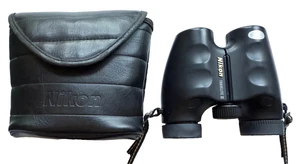 EXCELENTES PRISMÁTICOS NIKON TRAVELITE III CON CORREA PARA EL CUELLO Y ESTUCHE DE CUERO - Imagen 1 de 6