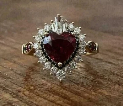 Anillo de compromiso con halo de diamantes y granate rojo corte corazón de 2,50 quilates chapado en oro rosa de 14 quilates Foto 1 de 4