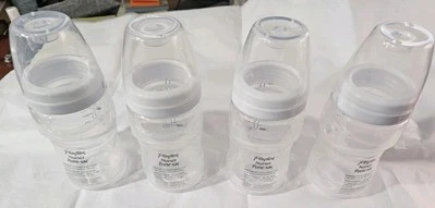 LOTE de 9 biberones Playtex para bebé con tapas tamaño de 4 oz Foto 1 de 4