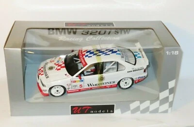 1/18 UT Models  BMW Team Bigazzi BMW 320i Warsteiner STW 1997 #5  J.Cecotto - Image 1 of 4