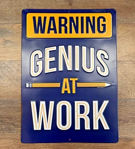 "Genius At Work" Embossed Metal Wall Sign 14" x 10" - Picture 1 of 3