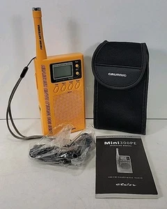 GRUNDIG MINI 300 SHORTWAVE RADIO - AM/FM/SW/CLOCK - WITH CASE, MANUAL, EAR BUDS - Picture 1 of 9