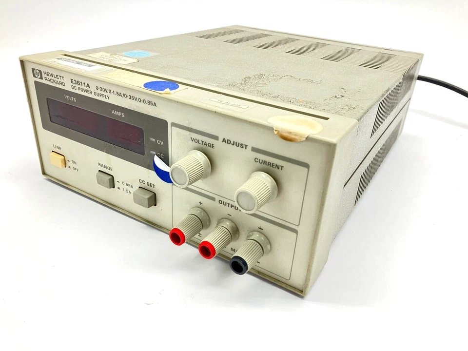 Fuente de alimentación HP E3611A DC 0-20V, 0-1.5A/0-35V,0-0.85A PANTALLA ROTA Foto 1 de 4