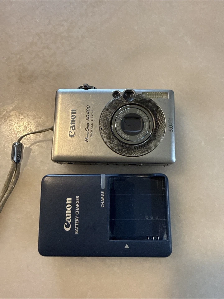 佳能 PowerShot SD400 数码 ELPH (PC1150) 银色 500 万像素 3 倍数码相机 可正常工作 — 第 1/4 张图片