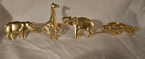 Serviettenringe Safari Four Set Jaguar. Giraffe. Nashorn.Elefant goldfarben - Bild 1 von 2