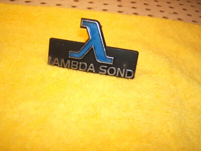 Volvo 1978 244 DL sedan Front Grille hang on LAMBDA SOND Volvo OEM 1 Emblem - Image 1 of 4