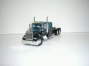 DCP FIRST GEAR 1/64 BLACK AND TEAL KENWORTH W900L WITH 60" SLEEPER - Picture 1 of 5