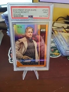2023 Topps Finest Star Wars Tobias Beckett Orange /25 PSA 9 Gem FN-88 - Bild 1 von 3