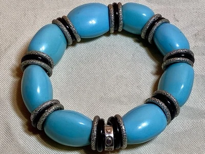 Bracciale GIODORO elastico Con Perle Ovali Turchese E Anelli Color Argento Neri  - Immagine 1 di 3