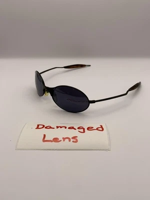Gafas de sol Oakley para hombre negras titanio alambre E ovaladas marcos de metal vintage Foto 1 de 4