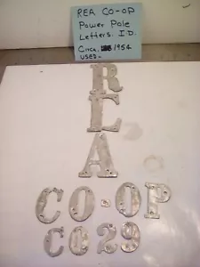 12 EA. VINTAGE RURAL ELECTRIC ASSOC. CO-OP POWER POLE ALUMINUM ID. LETTERS USED - Picture 1 of 5
