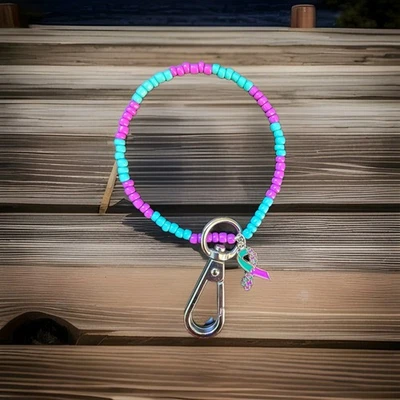 Muñequera con llavero con cuentas Suicide Awareness | verde azulado y púrpura con dije | Hecha a mano... Foto 1 de 4