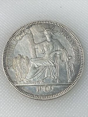 1909 french indochina one piastre S1 - Image 1 of 2