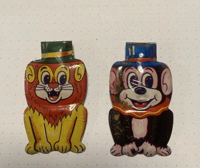 jouets, clickers anciens LION & SINGE - Photo 1/4