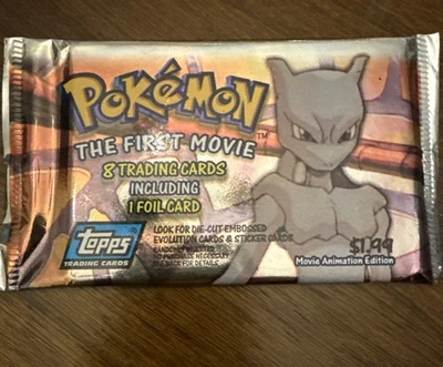 Tarjeta coleccionable Pokémon "La primera película" sellada sin abrir logotipo Topps azules - 1998 Foto 1 de 2