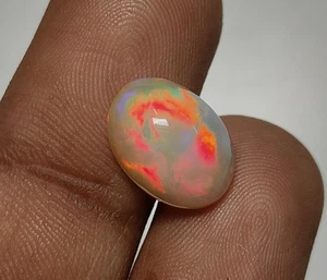 Welo Ethiopian Opal Oval Shape Cabochon Multi Flashy Fire Loose Gemstone 9x13MM - Picture 1 of 24
