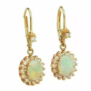 2,50 kt ovaler Schliff simulierter Feueropal Ohrhänger/Ohrhänger 14 K Gelbgold-Finish - Bild 1 von 4