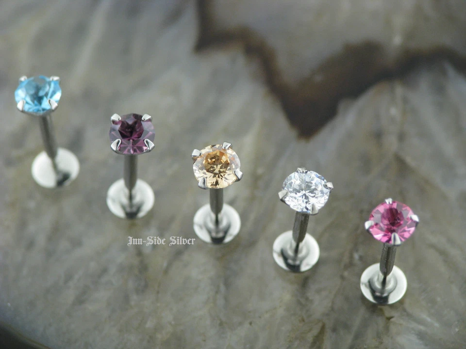 Piercing TRAGUS Labretstecker 7 Kristallfarben Ohrstecker Lippe Wange Helix Ohr - Bild 1 von 1