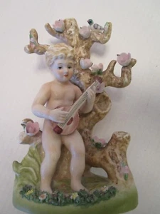 "Estatuilla antigua querubín putti bisque porcelana rosas Alemania 9,75"" numerada en T" - Imagen 1 de 9
