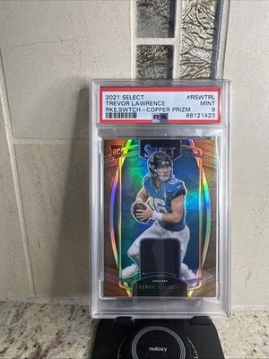 2021 Select Trevor Lawrence Copper Prizm Rookie Swatch /49 PSA 9 Low Pop - Image 1 of 2