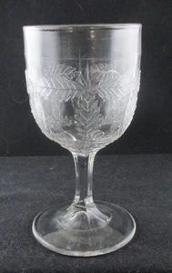 1870S EAPG CLEAR FLINT GLASS GOBLET CROSSED PRESSED LEAF GLOWS BLUE 6INCH TALL - Picture 1 of 4