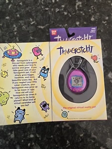 Bandai Tamagotchi 1996-1997 - (1800) VIOLA nuovo con scatola realtà virtuale animale domestico - Foto 1 di 9