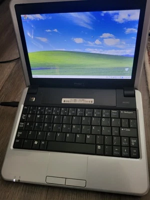 Dell Inspiron Mini 910 1.60GHz, 2GB RAM 16GB SSD Windows XP Laptop, 32GB SD Card - Image 1 of 3