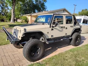 2011 Jeep Wrangler Unlimited Sahara Sport Utility 4D - Picture 1 of 24