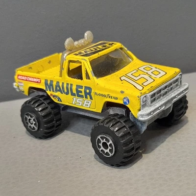 GMC Pickup Monster Truck High Roller Mauler Goodyear amarillo diecast 1:64 Foto 1 de 4