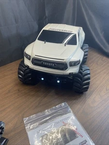 65+mph JLB Racing Cheetah Rc Truck 120a 4s RTR Brushless 1/10 Toyota Tundra USA - Picture 1 of 24