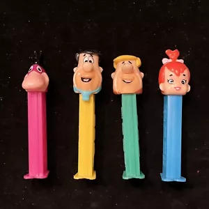 Juego de 4 Dispensadores Dino Pez Picapiedra Fred Barney Guijarros De Colección - Imagen 1 de 4