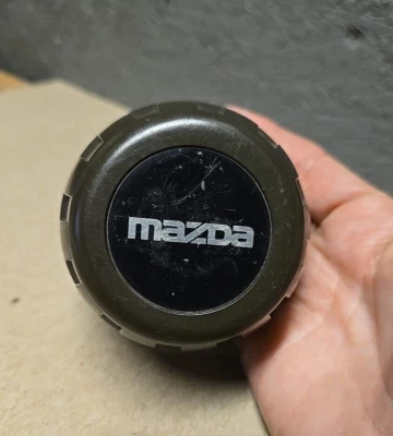  1991 - 1993 年马自达 323 原始设备制造商中心盖 #887137191 — 第 1/4 张图片