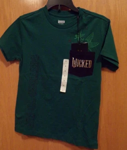Wicked the Movie~Green SS Pocket Tee~Assorted Sizes~Paul Tazewell~New W/Tags - Picture 1 of 2