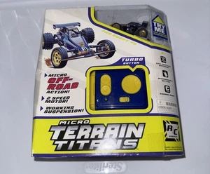 Coche de radiocontrol Tomy Tamiya Micro Terrain Titans Spin Master Buggy 2007 - Imagen 1 de 6