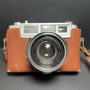 Macchina fotografica vintage Yashica LYNX-1000, telemetro 35 mm con custodia - non testata - Foto 1 di 15