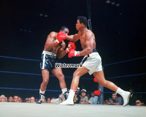 1965 Muhammad Ali (Cassius Clay) lanza un puñetazo vs Sonny Liston 8 X 10 foto - Imagen 1 de 1