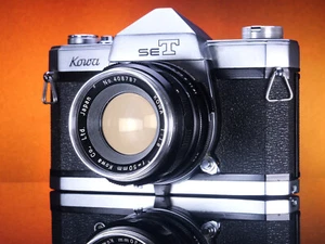 Kowa SET fotocamera reflex pellicola 35 mm con obiettivo 50 mm f1.8 - LEGGI #108935 - Foto 1 di 10