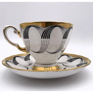 Taza de té y platillo Toscan Bone China - vieira negra y borde dorado - Inglaterra - De colección - Imagen 1 de 9