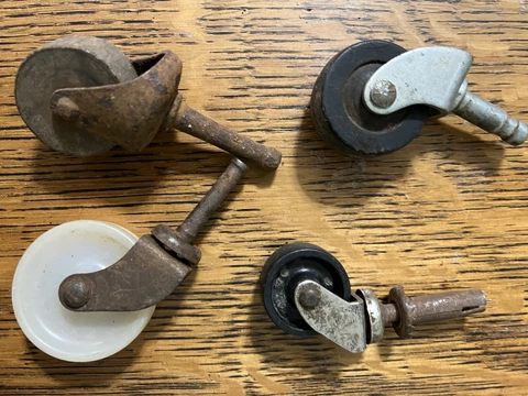 Lot of 4 Vintage Casters. Wood, Plastic Cover