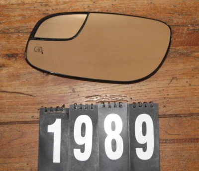 Espejo retrovisor lateral puerta delantera izquierda Ford Taurus 2012-2019 OEM SOLO Foto 1 de 4