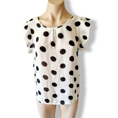 Blusa blanca, cuello alto redondo, lunares negros. Top pull-over, holgado Foto 1 de 4