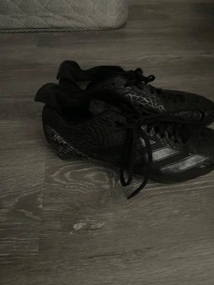 Sports cleats - Image 1 of 2