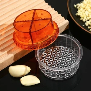 Trituradora de ajo de cocina 2 en 1 manual prensa de ajo rollo trituradora picadora - Imagen 1 de 10